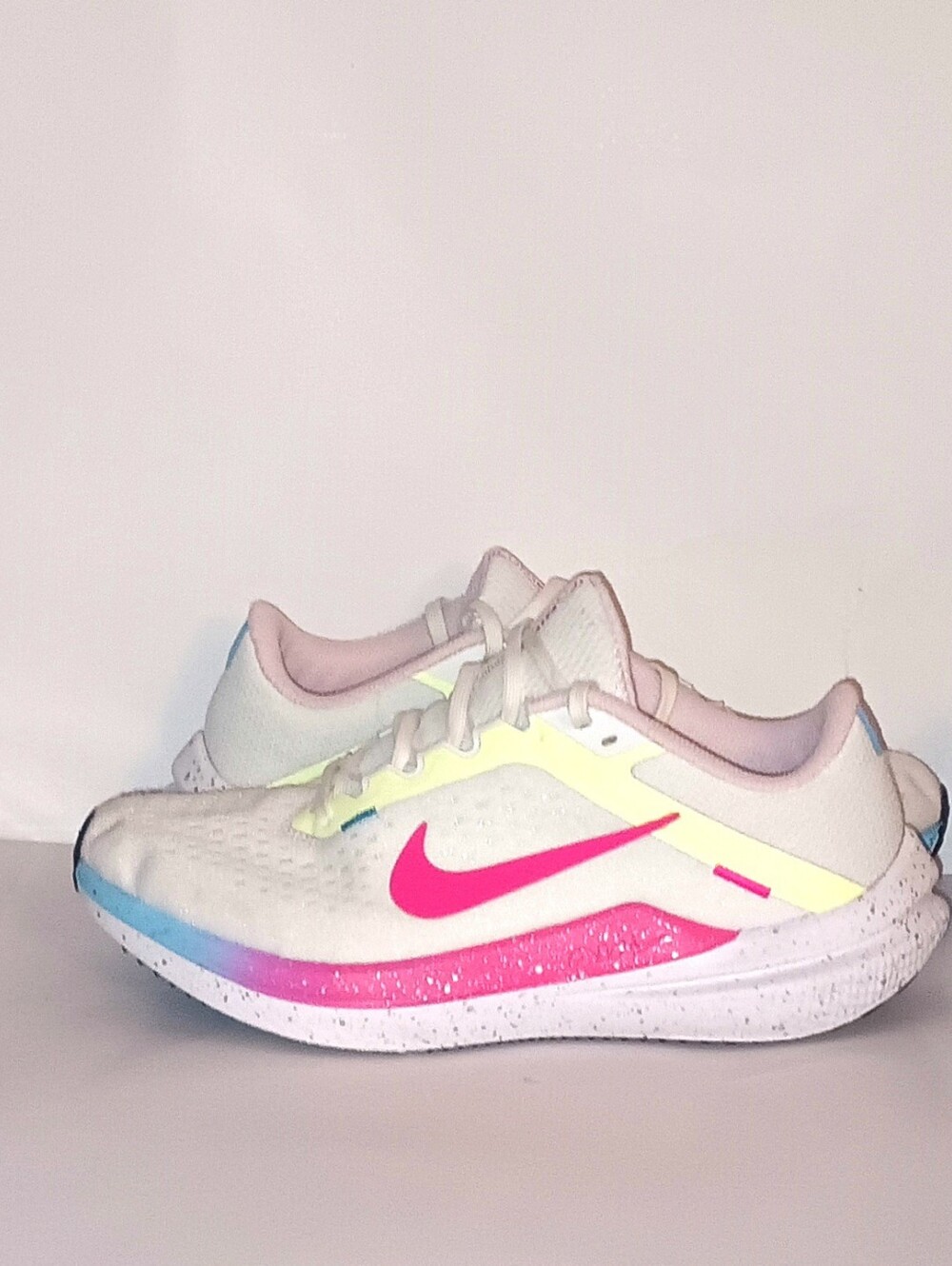 Nike Air Winflo 10 Hyper Pink Volt. Small piece of material scuff off of shoe.